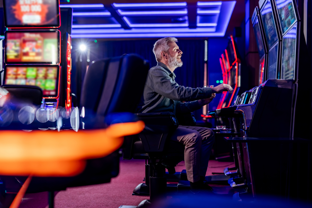 a person playing slot at casino UK